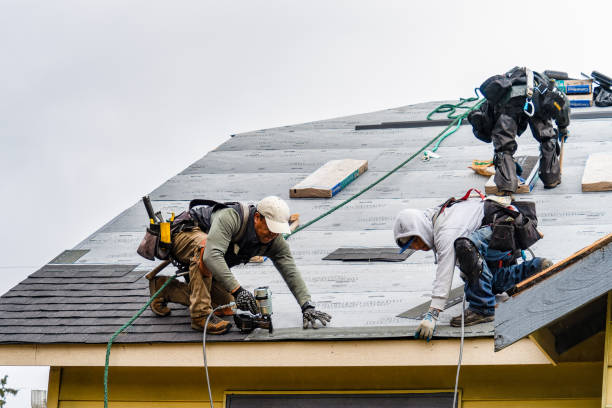 Professional Roofing technician working in Mantoloking, NJ